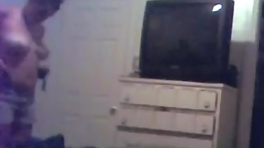 Bedroom teen changing to bikini top