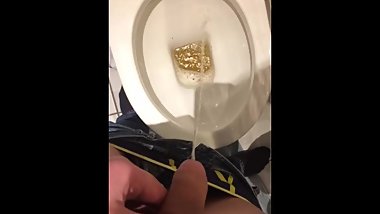 Young twink pissing