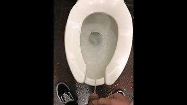 Asian boy taking a long piss