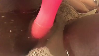 Young ebony teen plays with her pussy in bath tub