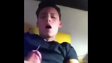 Teen boy spunks all over his shirt