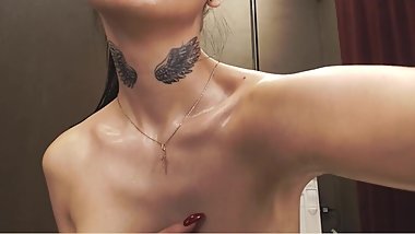 camgirl with a weird tattoo on her neck