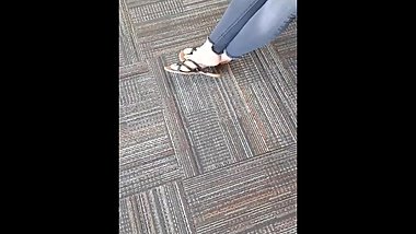 Asian girl's feet at cafeteria