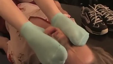 Girl gets stinky socks and feet in her face